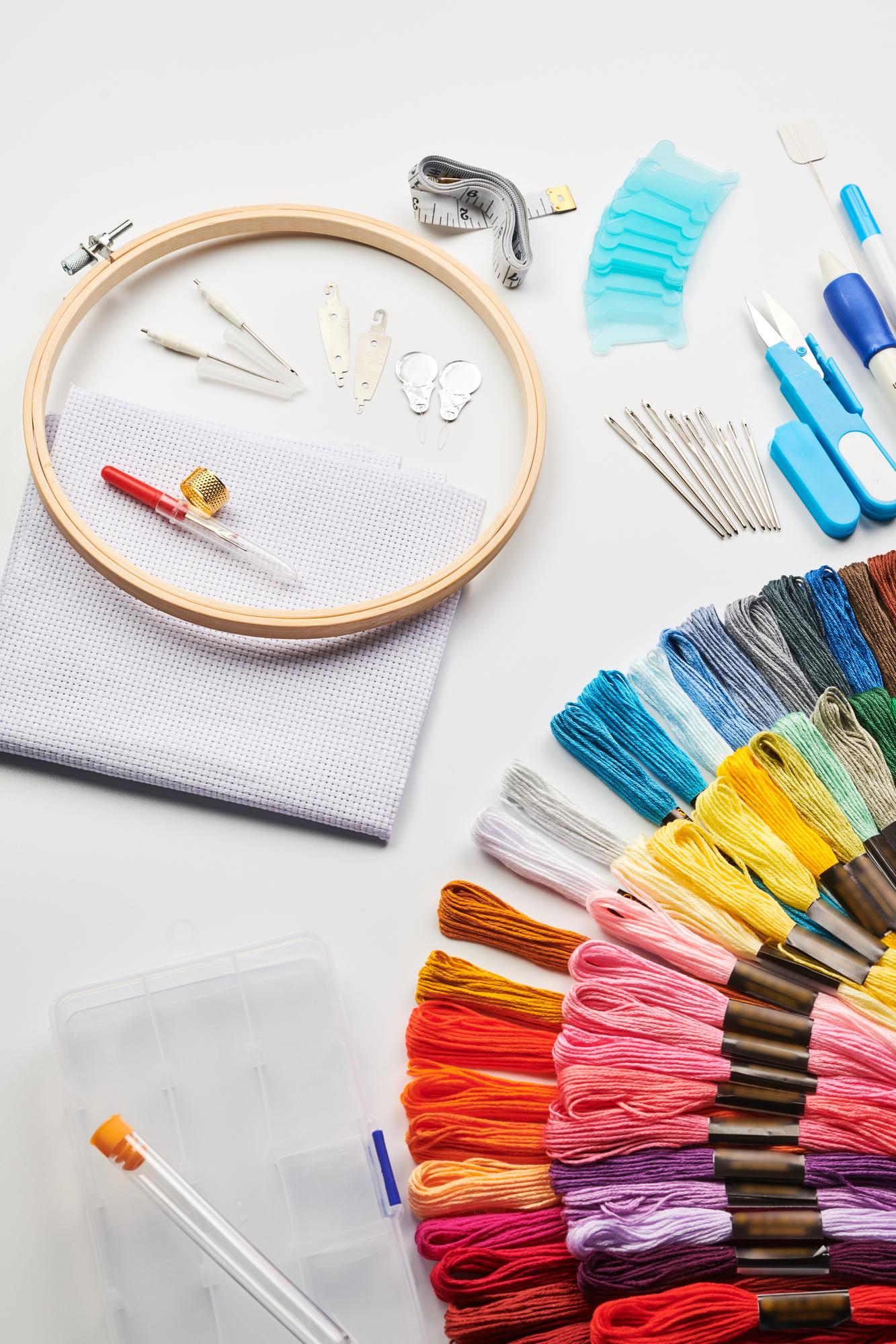 Atelier table with threads and sample swatches