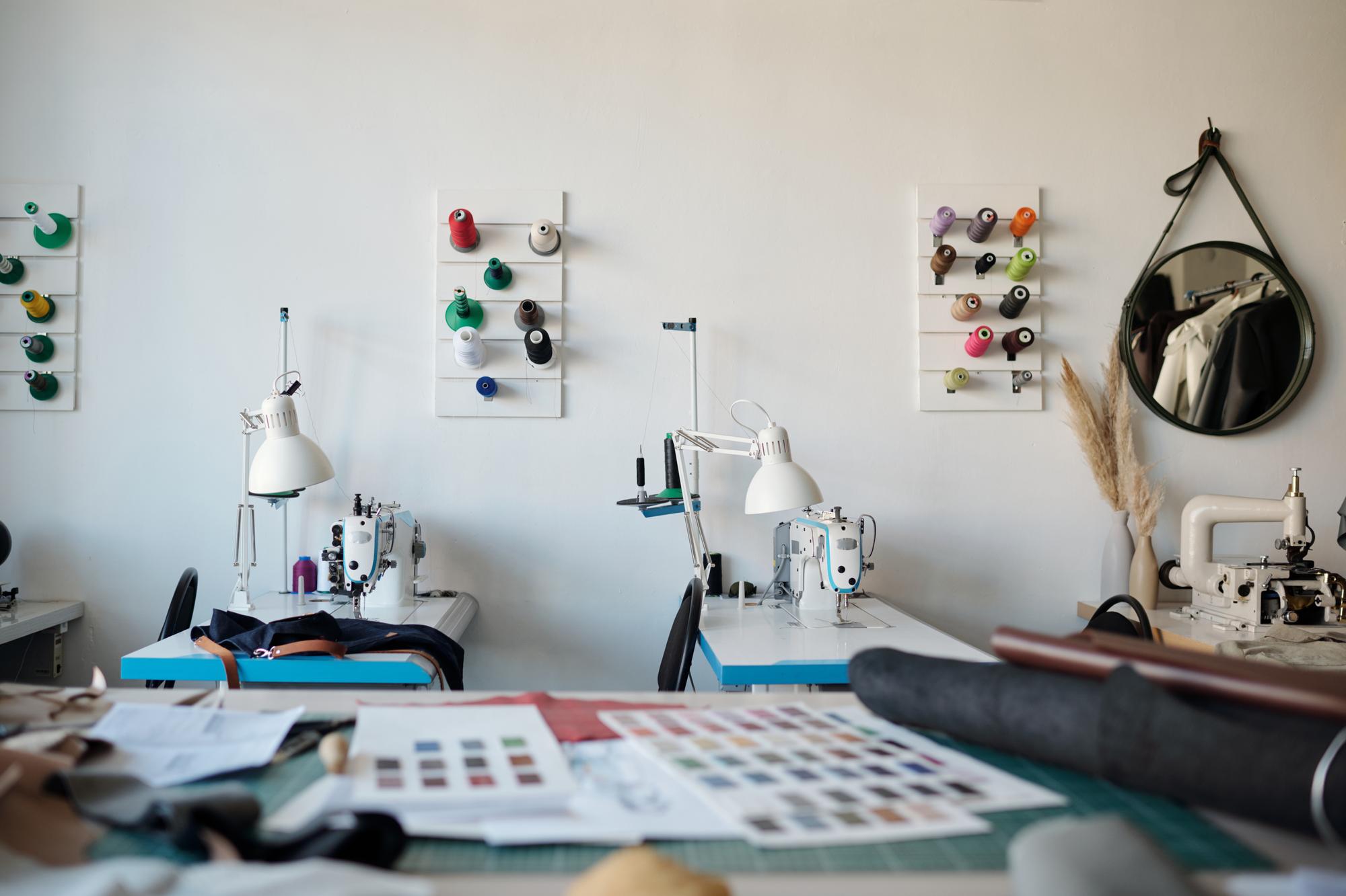 Studio workbench with embroidery machine and hoops
